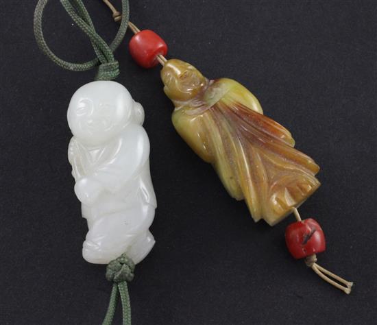 A Chinese white jade figure of a boy and a jadeite carving of a luohan, 3.7cm